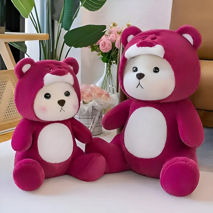 red plush bear in a hoodie with floppy ears