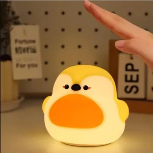 "Touch-activated Robin Bird Lamp glowing on a desk"
